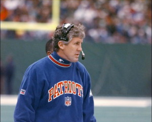 New England Patriots' coach Pete Carroll keeps an eye on the