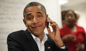 Obama-smiling-on-phone-92676927366-300x180