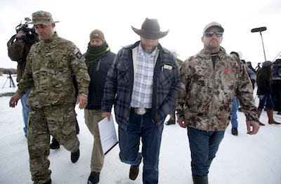 Ammon Bundy departs after addressing the media at the Malheur National Wildlife Refuge near Burns